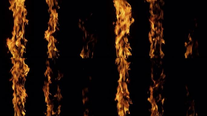 在黑色背景上近距离拍摄慢动作: 三根垂直的木棍着火，在美丽的火焰中燃烧。特殊效果、视觉效果、后期制作