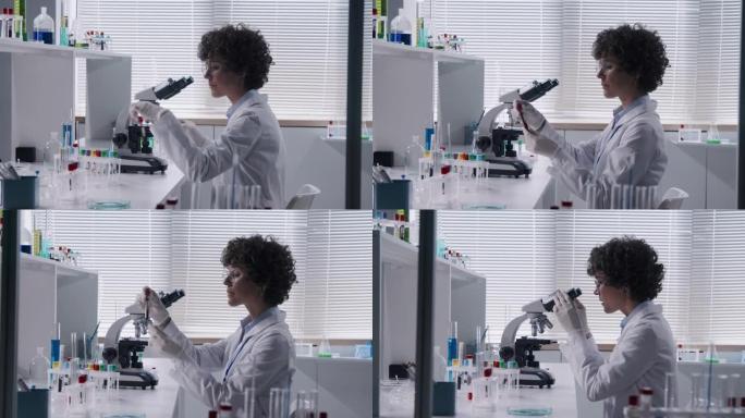 科学家在工作场所使用显微镜