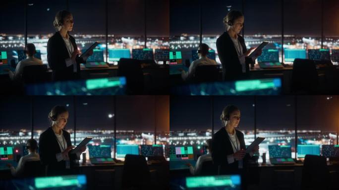 高加索女性空中交通管制员在机场塔楼的平板电脑上工作。办公室里满是台式电脑显示屏，配有导航屏幕，飞机飞