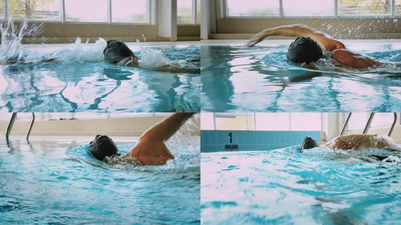 自适应截肢者专业游泳运动员在室内游泳池前爬行游泳