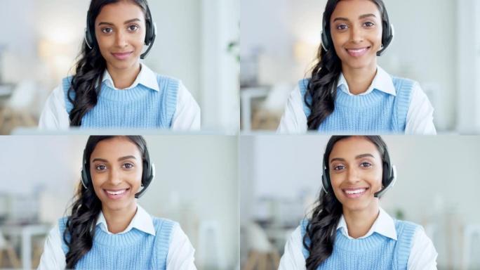 呼叫中心代理在咨询客户服务和销售支持时使用耳机的肖像。自信的年轻女商人在操作服务台时微笑着，看上去很