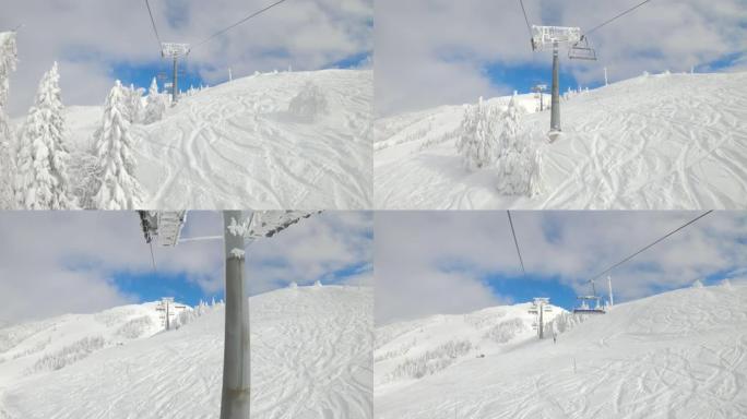 POV: 在斯洛文尼亚的一个滑雪胜地的履带式斜坡上乘坐滑雪缆车。