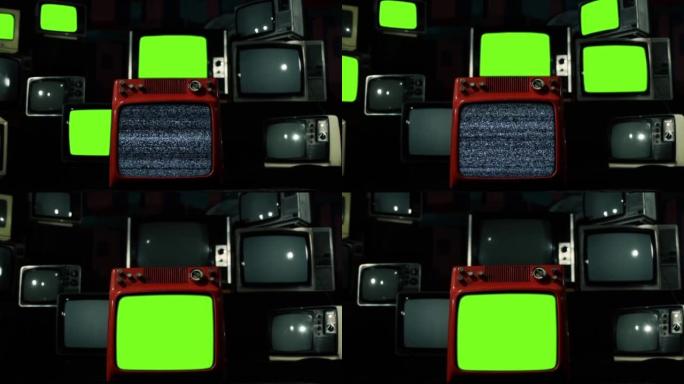 堆砌复古电视，闪烁绿色色度屏幕。放大。