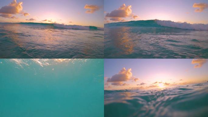特写: 绿松石桶波在相机上滚动拍摄日落。