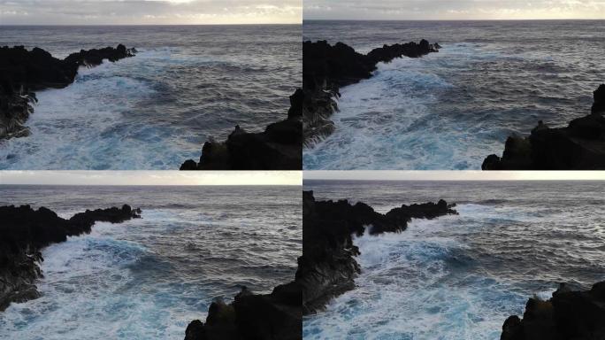 智利复活节岛的悬崖上破浪。