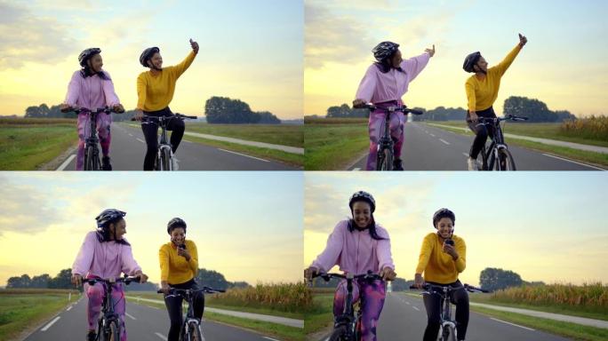 跟踪，手持拍摄两名成年女性在高速公路上骑行，在道路上行驶时自拍，慢动作