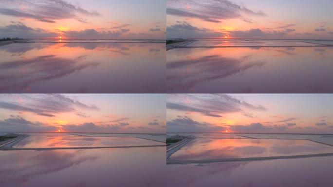 空中: 日落时拉斯科拉达斯粉红色盐田的风景如画。