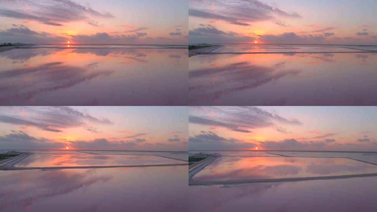 空中: 日落时拉斯科拉达斯粉红色盐田的风景如画。