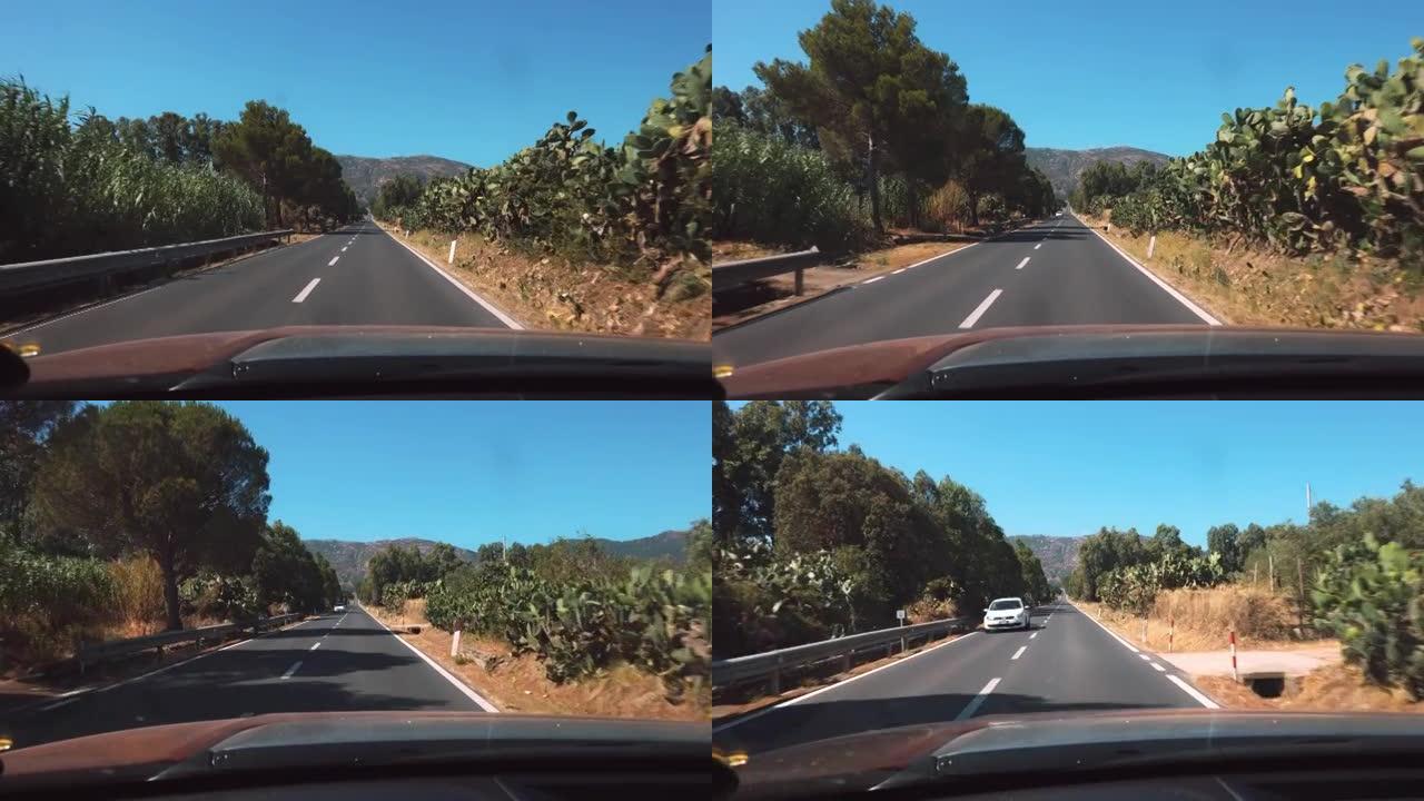 在乡村行驶的汽车的观点，汽车的观点，撒丁岛，意大利。