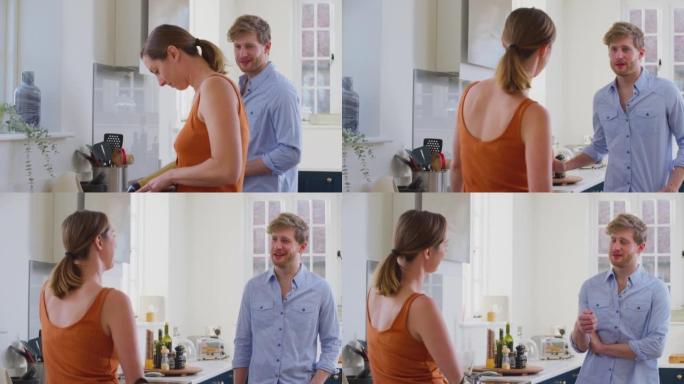 夫妻在家里和带假肢的女人在厨房一起准备饭菜-慢动作拍摄