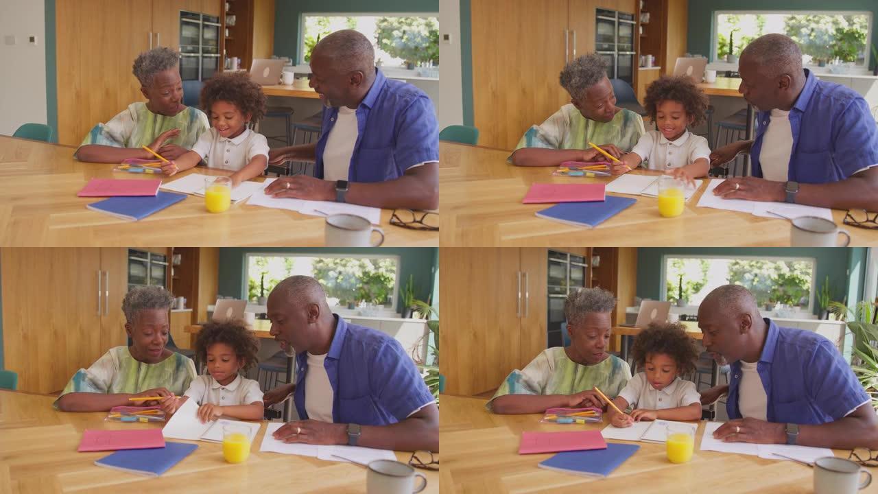 多代家庭，祖父母帮助孙子在家做作业，坐在桌边慢动作拍摄