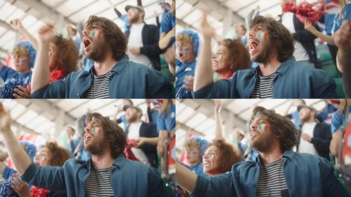 体育馆足球比赛: 激动的西班牙裔夫妇与意大利国旗彩绘的肖像欢呼队获胜，尖叫，乞求，大笑。人群庆祝进球