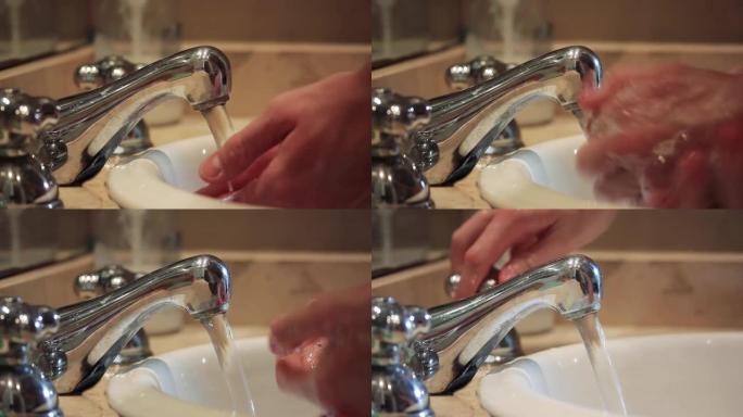 在新型冠状病毒肺炎的全球流行期间，男人洗手。