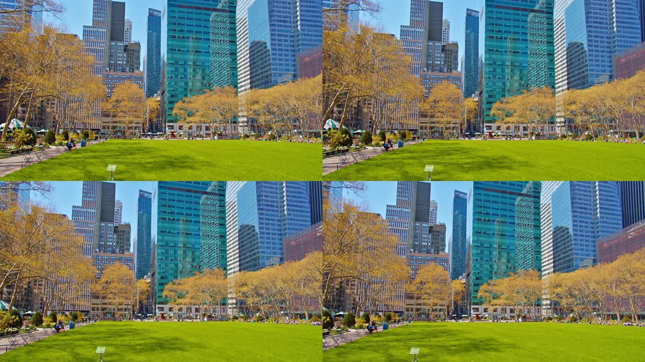 布莱恩特公园。空的大绿色草坪。人们休闲休息。金融大厦。纽约