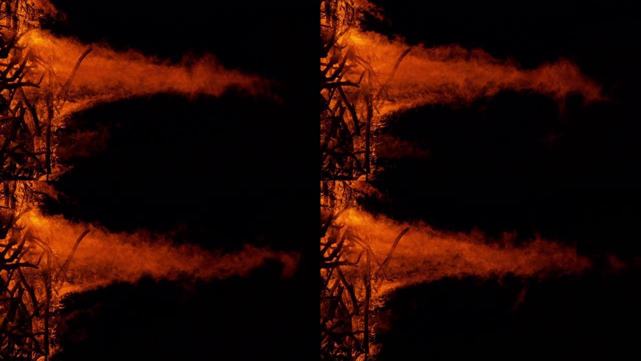 垂直: 巨大篝火的美丽镜头升入黑暗的夏日夜空。