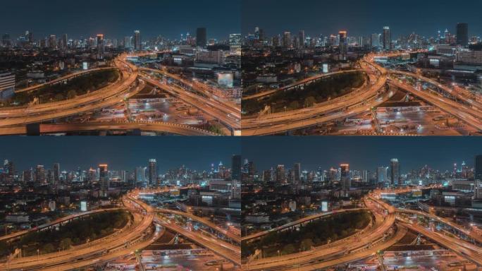 曼谷市带摩天大楼的高速公路上汽车交通运输的夜间延时