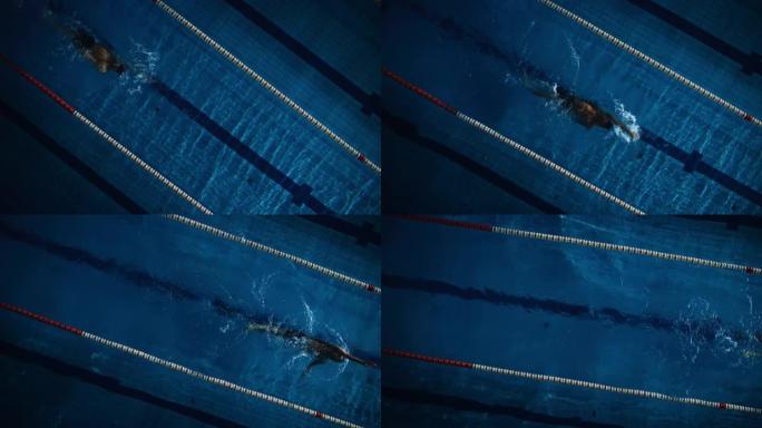空中俯视图: 游泳池中肌肉发达的男性游泳者。专业运动员以仰泳的方式游泳，决心赢得冠军。深色戏剧色彩，