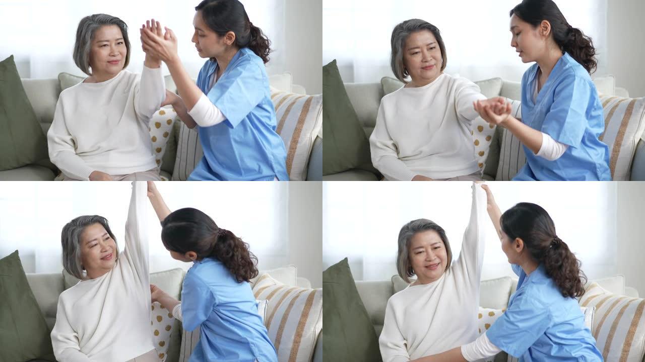 护士理疗为在家中伸展手臂的高级妇女提供物理治疗服务
