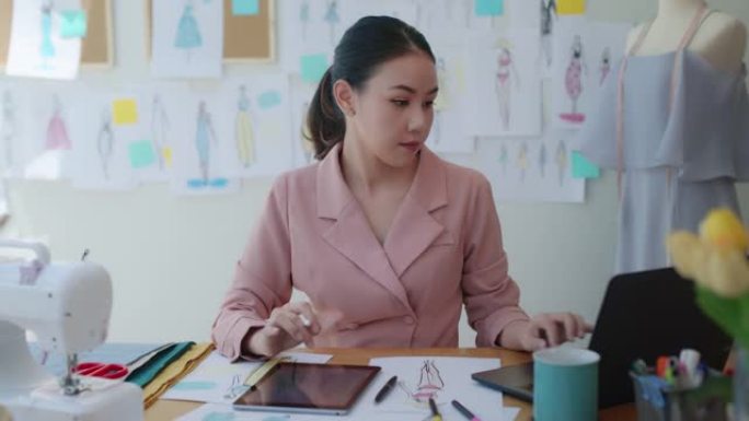 亚洲女性时装设计师裁缝小企业主企业家。