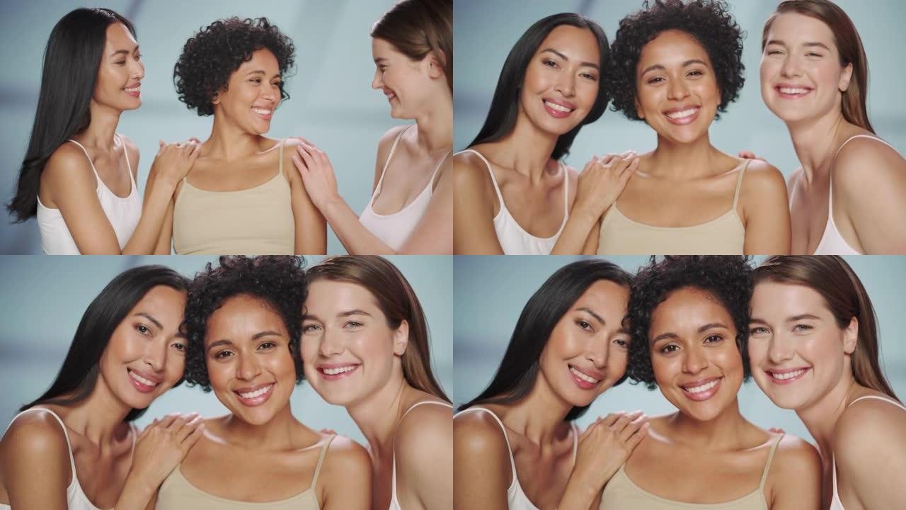 三个不同的多种族模型在孤立的背景上的美丽肖像。拥有自然健康皮肤的快乐亚洲、黑人和白人女性。健康、水疗