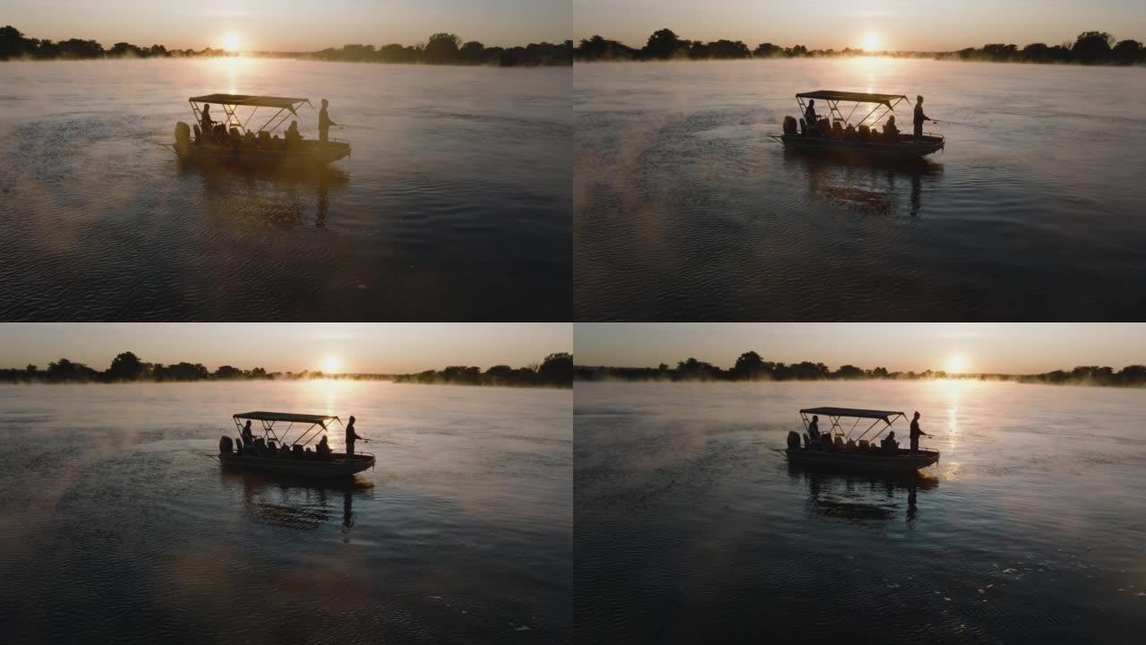 在赞比西河上钓鱼的旅游船的特写鸟瞰图