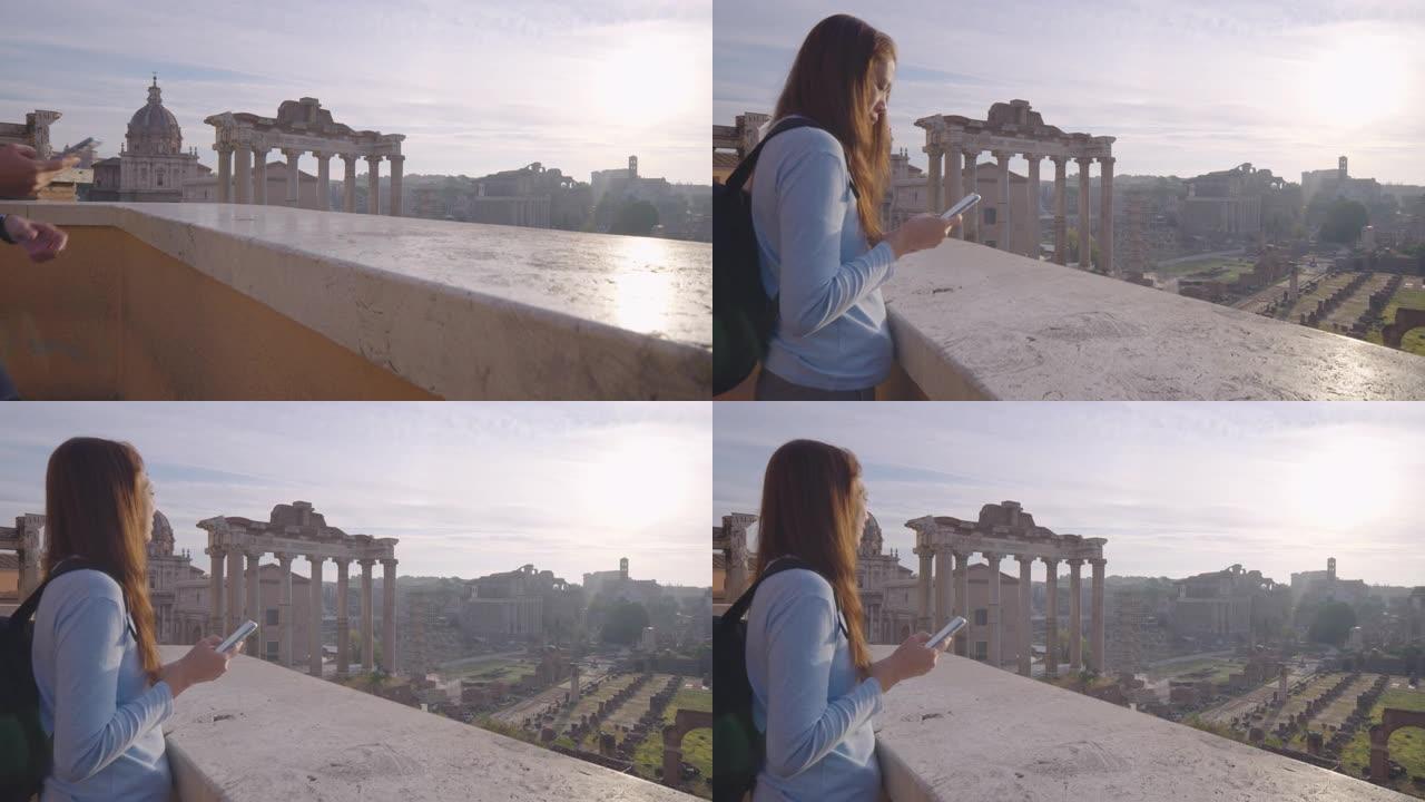 自由快乐旅行者年轻女性使用手机享受旅游假期意大利著名地标在罗马论坛，意大利欧洲。体验旅行与多样性概念