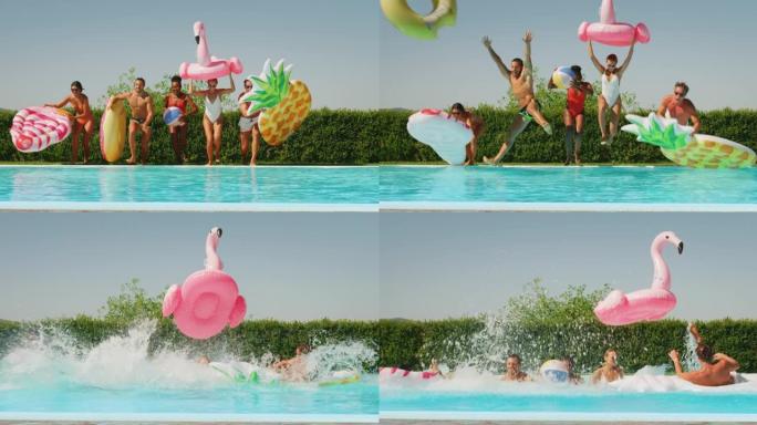 穿着泳衣的多民族年轻朋友的慢动作很开心，一起享受暑假，在阳光明媚的日子里在游泳池里跳进水里。