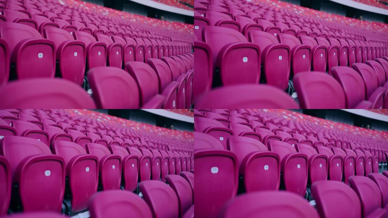 体育场座位空体育场内的红色体育场椅子观众