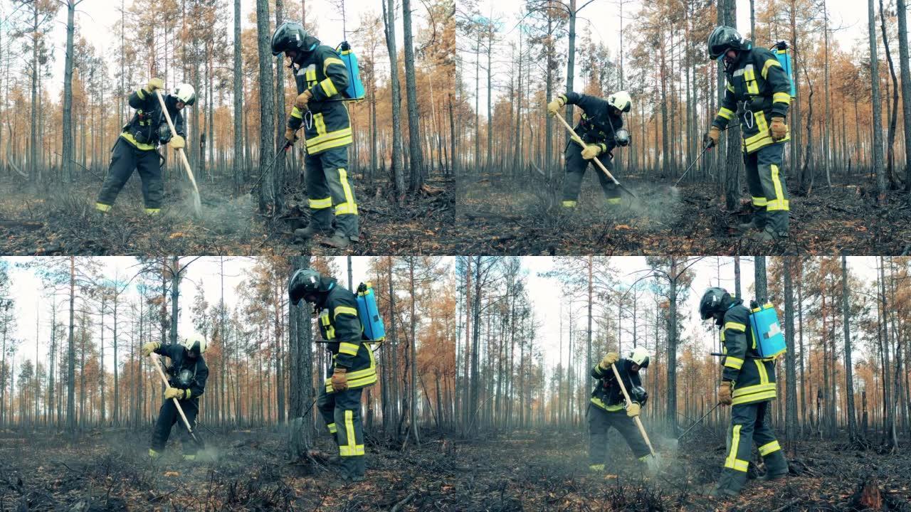 林地火灾区域，消防员将地面击倒