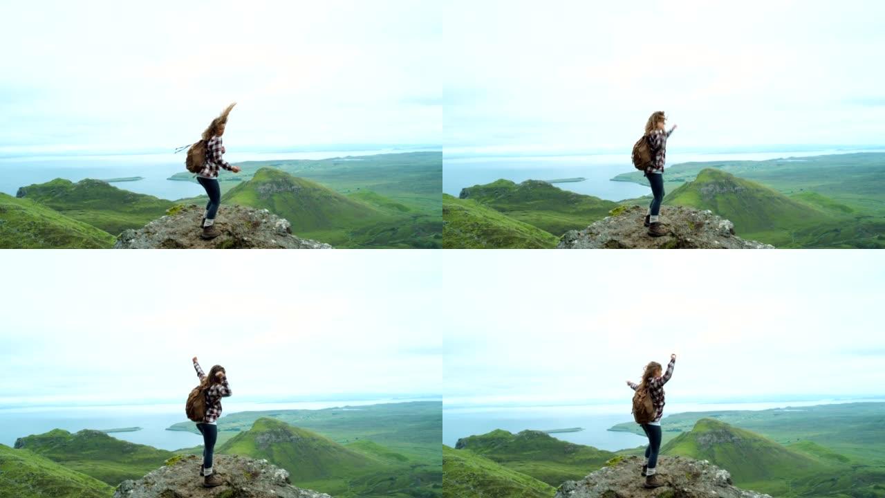 4k视频片段，一个无法识别的女人在远足时欣赏山景