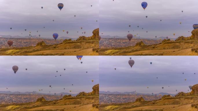 T/L气球在Turkiye卡帕多西亚的Goreme山谷上空升起