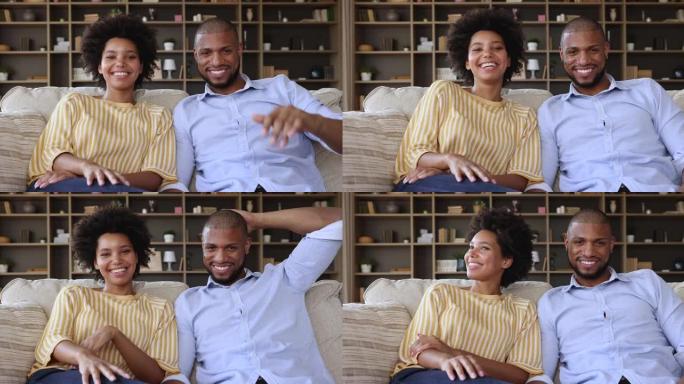 快乐的非洲夫妇通过视频会议应用程序开始愉快的对话