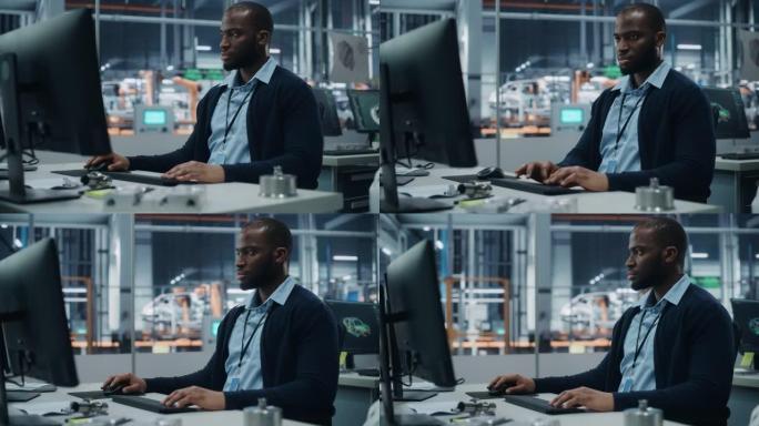汽车厂办公室: 自信的黑人男总工程师在台式电脑上工作的肖像。自动化机器人手臂装配线制造高科技电动汽车