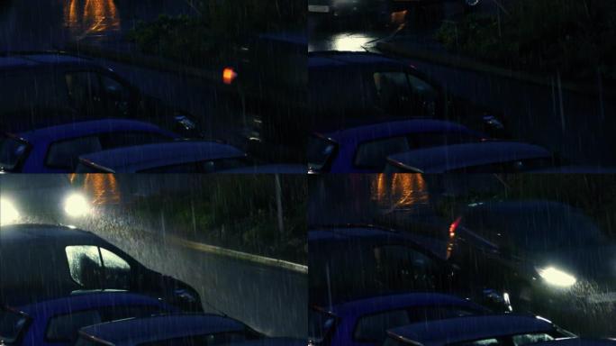 在暴雨中经过暴风雨的夜晚的汽车