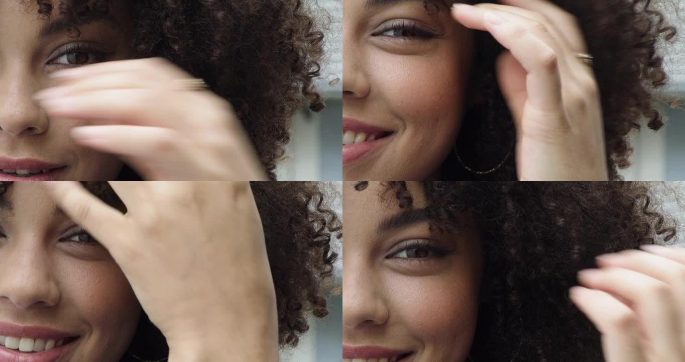 一个美丽的卷发年轻女子的4k视频片段
