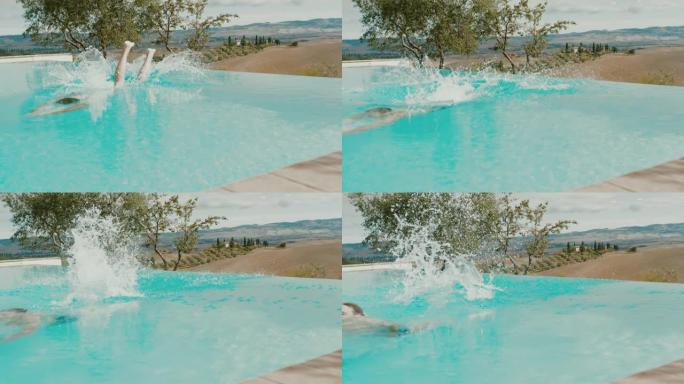 超级SLO MO男子跳入托斯卡纳度假别墅的游泳池