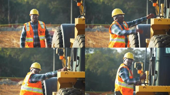 非裔美国建筑工人爬上推土机