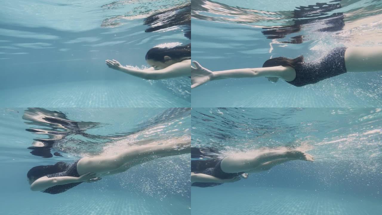 女人在水下游泳游泳