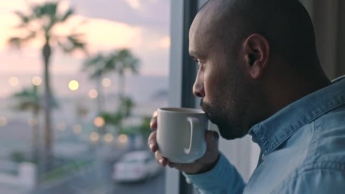 放松，日出和一个黑人在家里的窗户边喝咖啡。思考，喝酒享受，早上上班前深思熟虑。周末外出，奢华，从酒店