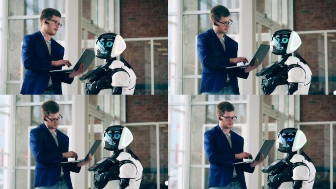 男性专家和机器人说话。未来，创新，科学，机器人概念。