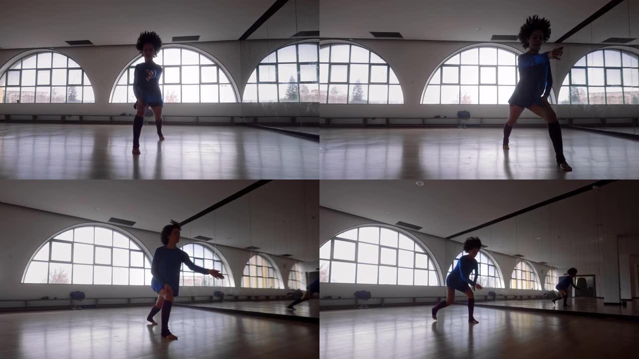 非裔美国妇女在工作室练习当代舞蹈套路