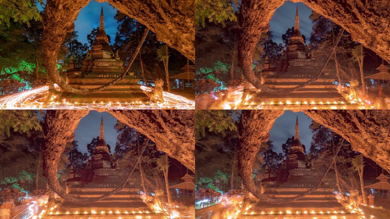 佛教大斋日黄昏时，古塔周围的延时蜡烛游行仪式