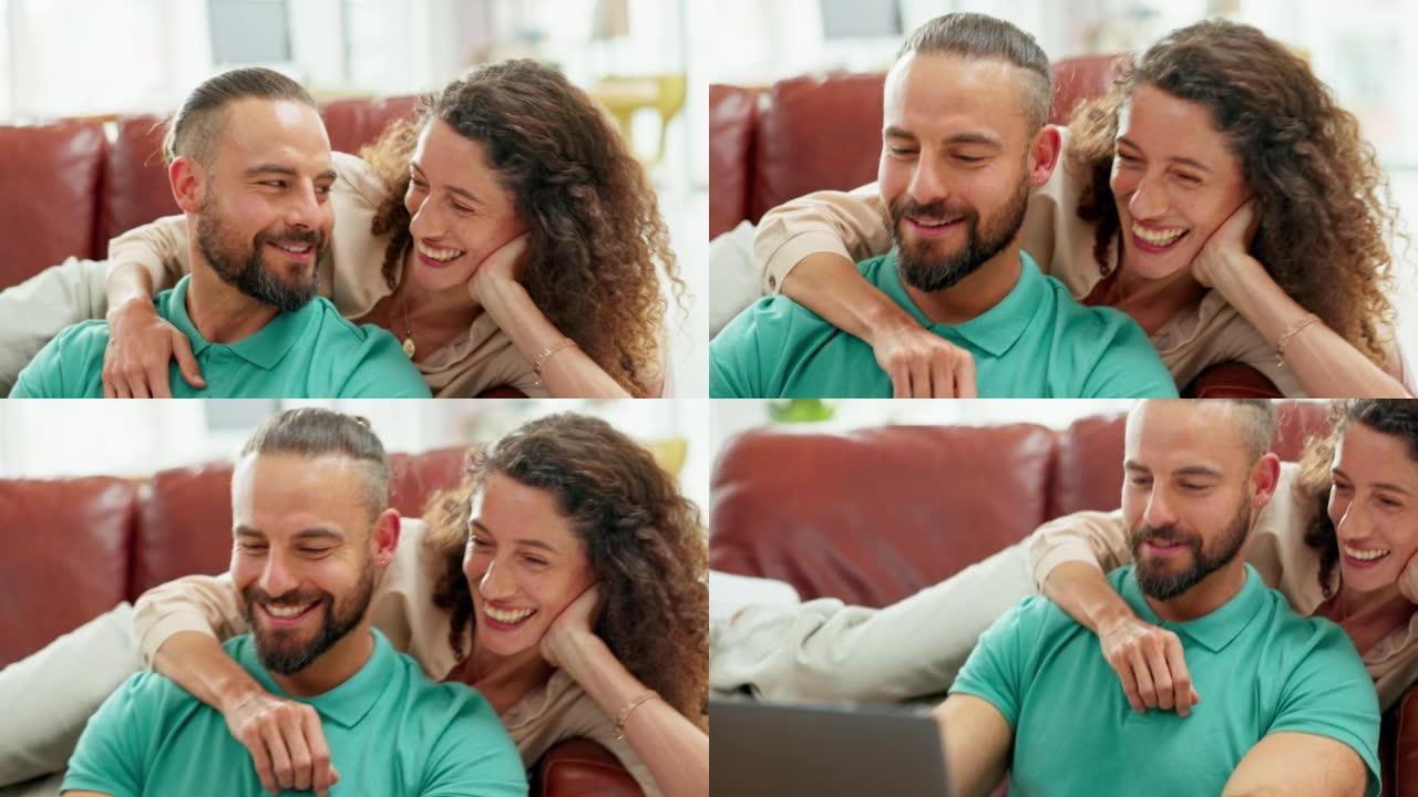 情侣在沙发上放松，在他们的家庭公寓里一起看笔记本电脑喜剧、搞笑节目或社交媒体模因。爱，幸福和年轻人在