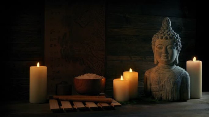 带蜡烛和佛陀的水疗室内