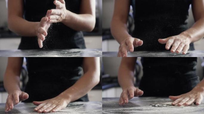 4k视频片段，一个无法辨认的女人在她的手撒粉并在厨房柜台上撒粉