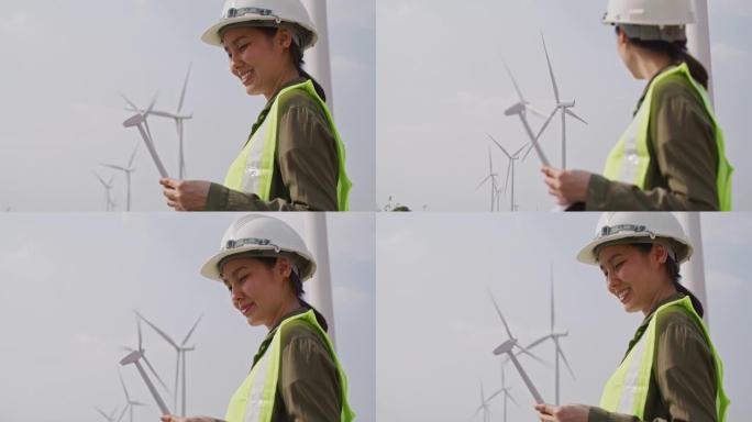 可再生能源系统电力维护工程师在风力涡轮机发电站现场工作