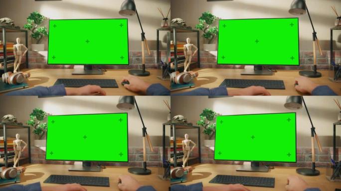 在具有绿屏模拟显示的台式计算机上工作的人的POV第一人称视图。男性坐在办公桌前，在时尚的客厅里浏览互