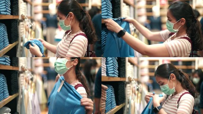 亚洲女性戴口罩购物