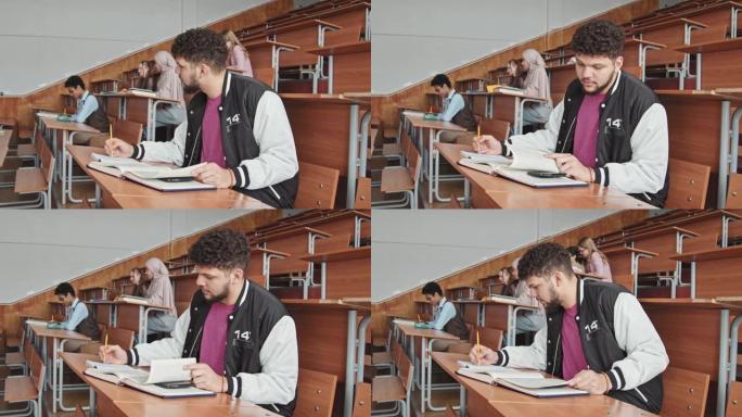 男生在考试中试图作弊