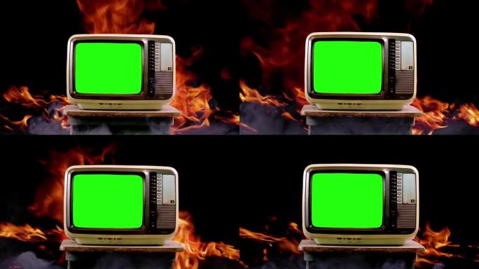 旧电视机，绿屏在火焰和火焰中。放大。4k分辨率。